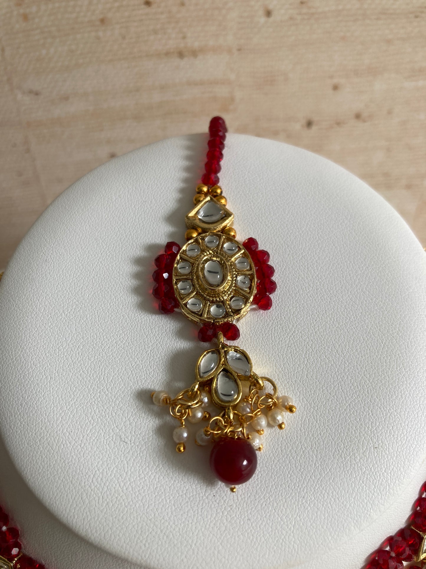 Saachi Gold Plated Kundan And Pearl Maroon Choker Set (ST184)