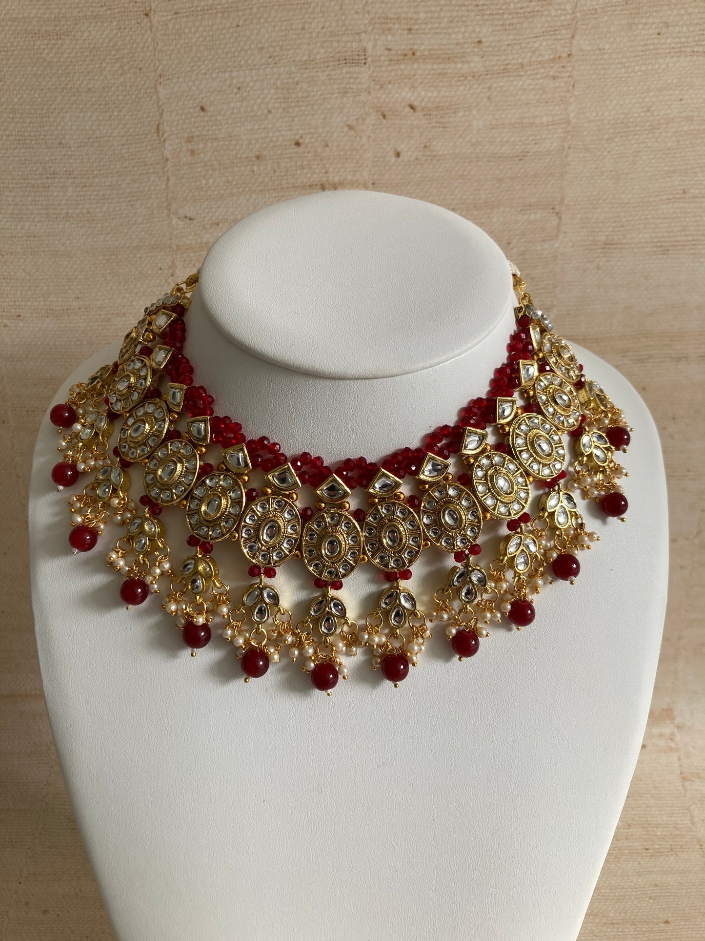 Saachi Gold Plated Kundan And Pearl Maroon Choker Set (ST184)