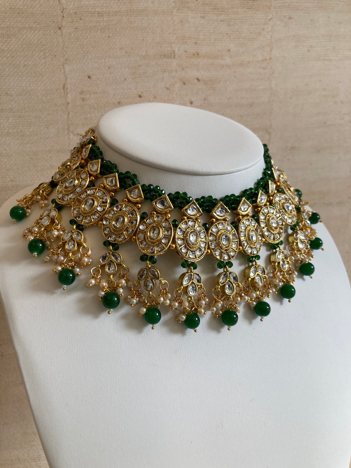 Saachi Gold Plated Kundan And Pearl Emerald Green Choker Set (ST184)