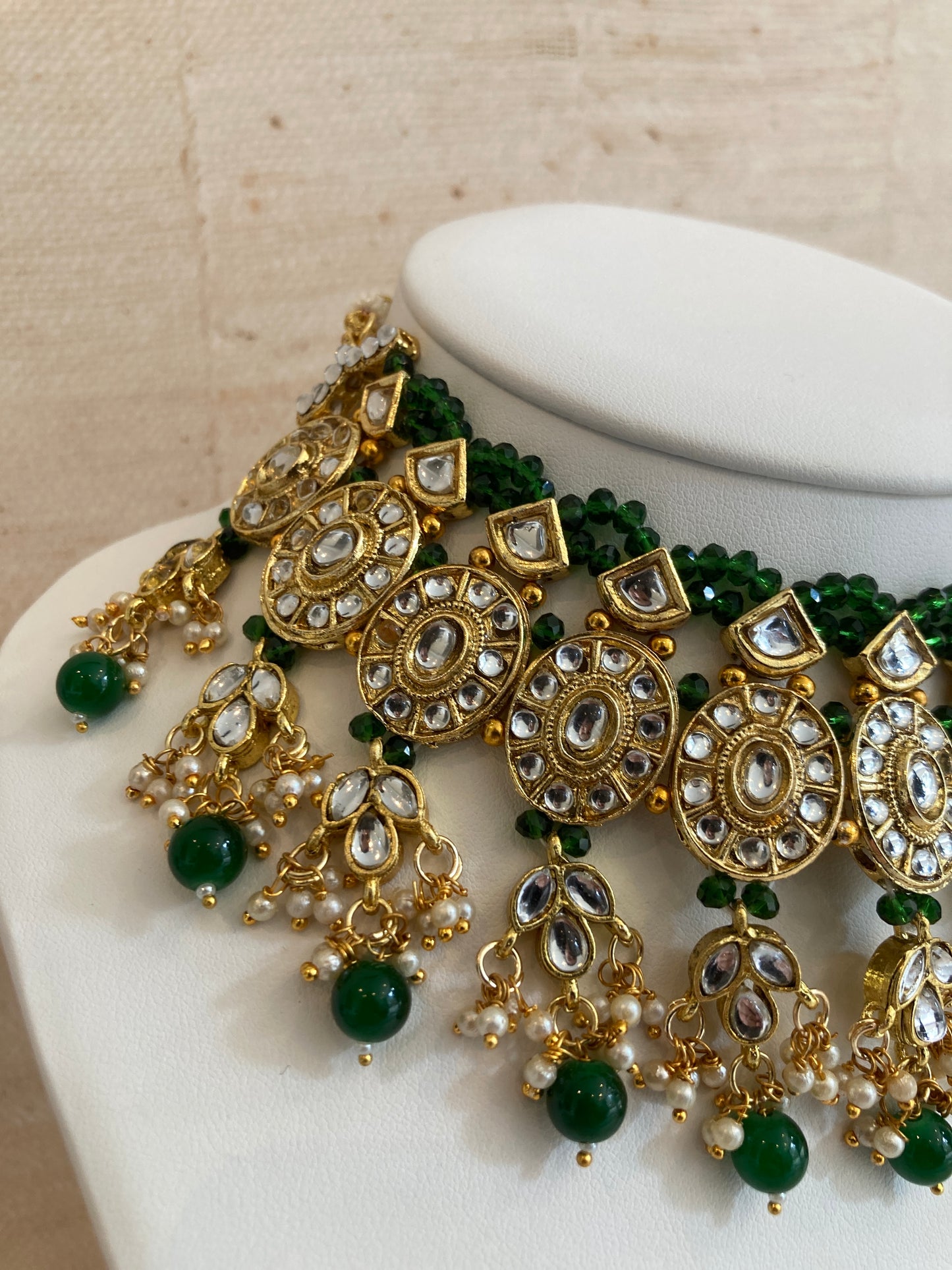 Saachi Gold Plated Kundan And Pearl Emerald Green Choker Set (ST184)