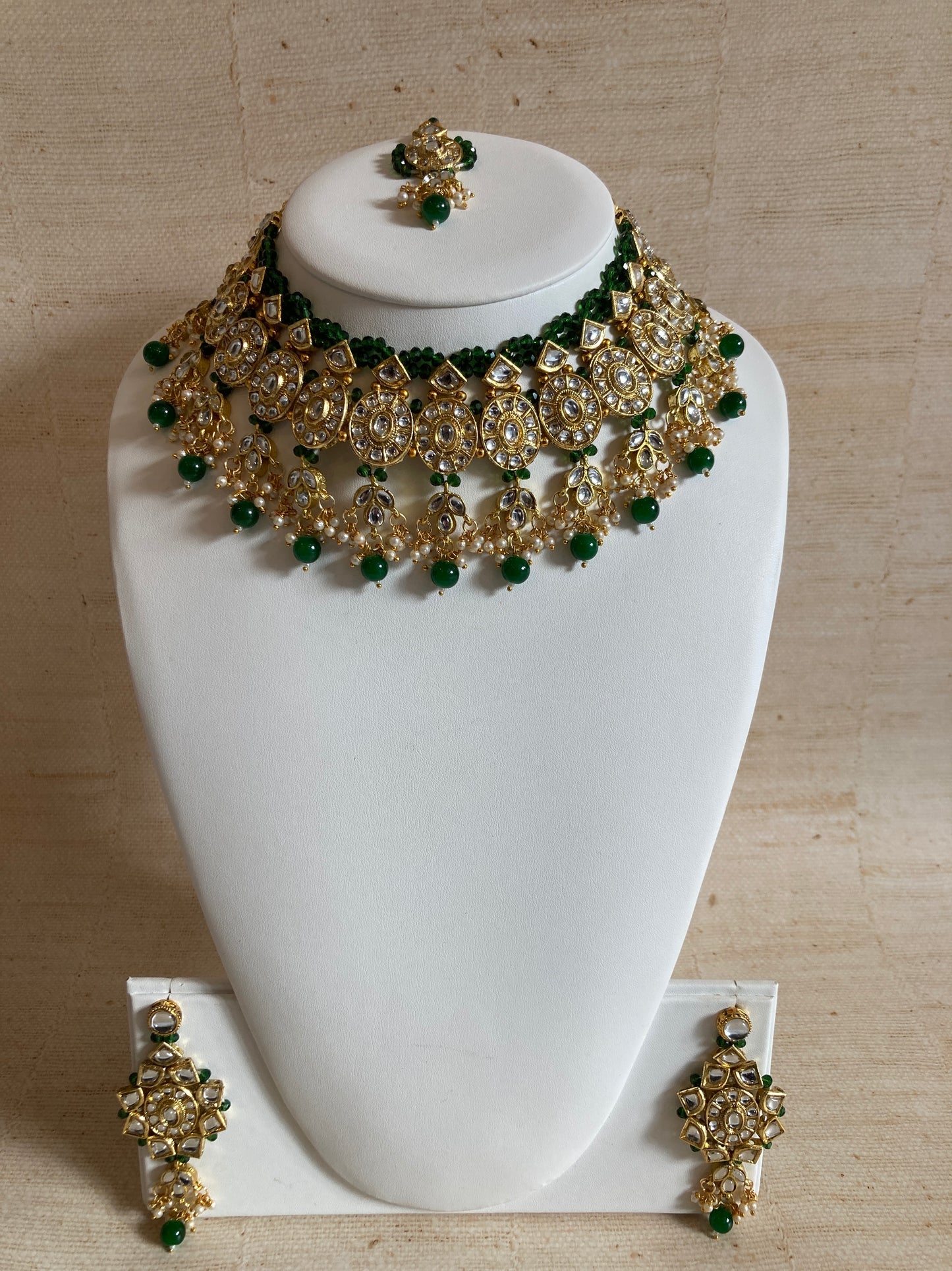 Saachi Gold Plated Kundan And Pearl Emerald Green Choker Set (ST184)
