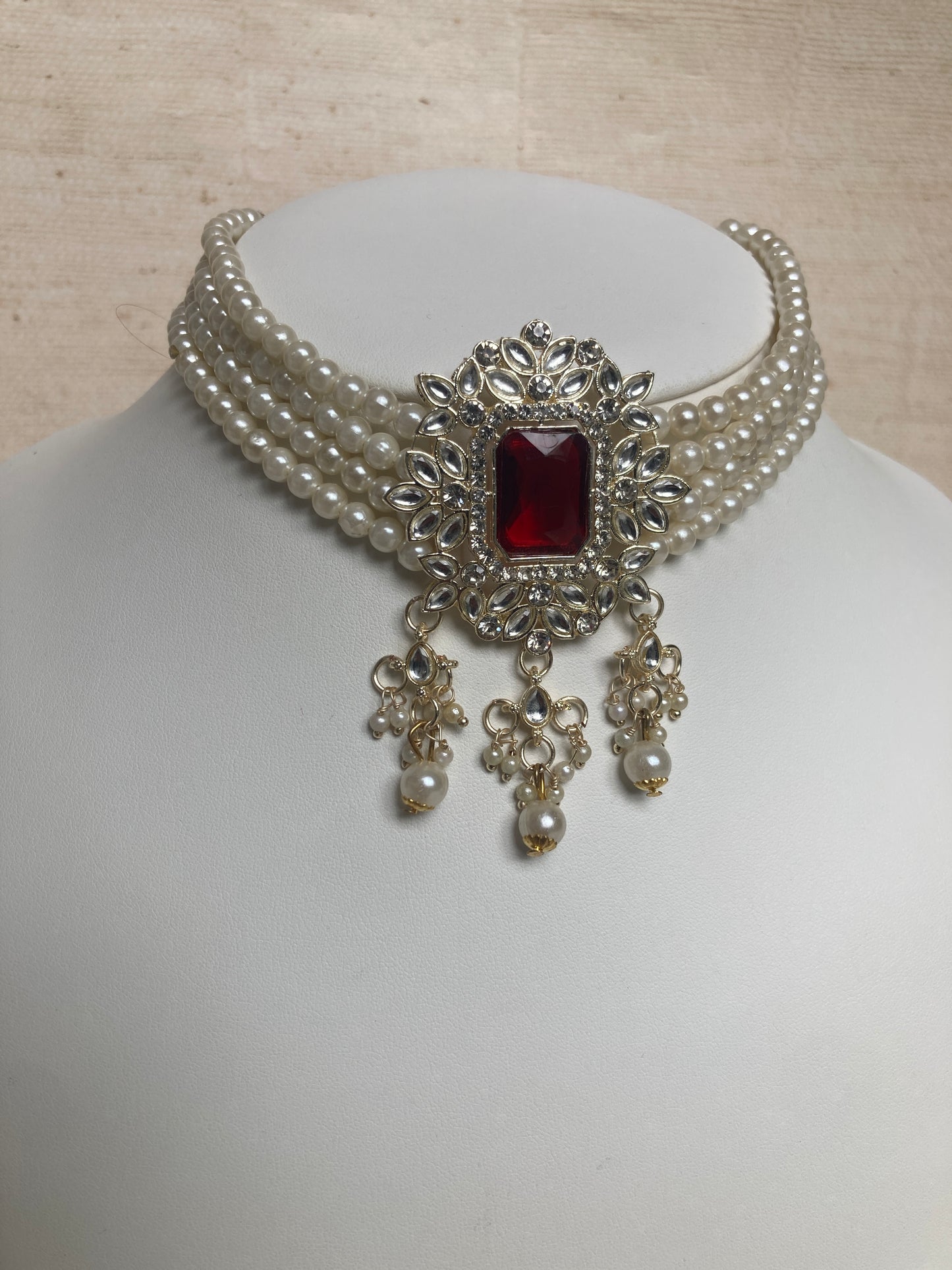 Anvi Gold Plated Kundan And Pearl Set (ST1013) (Maroon)