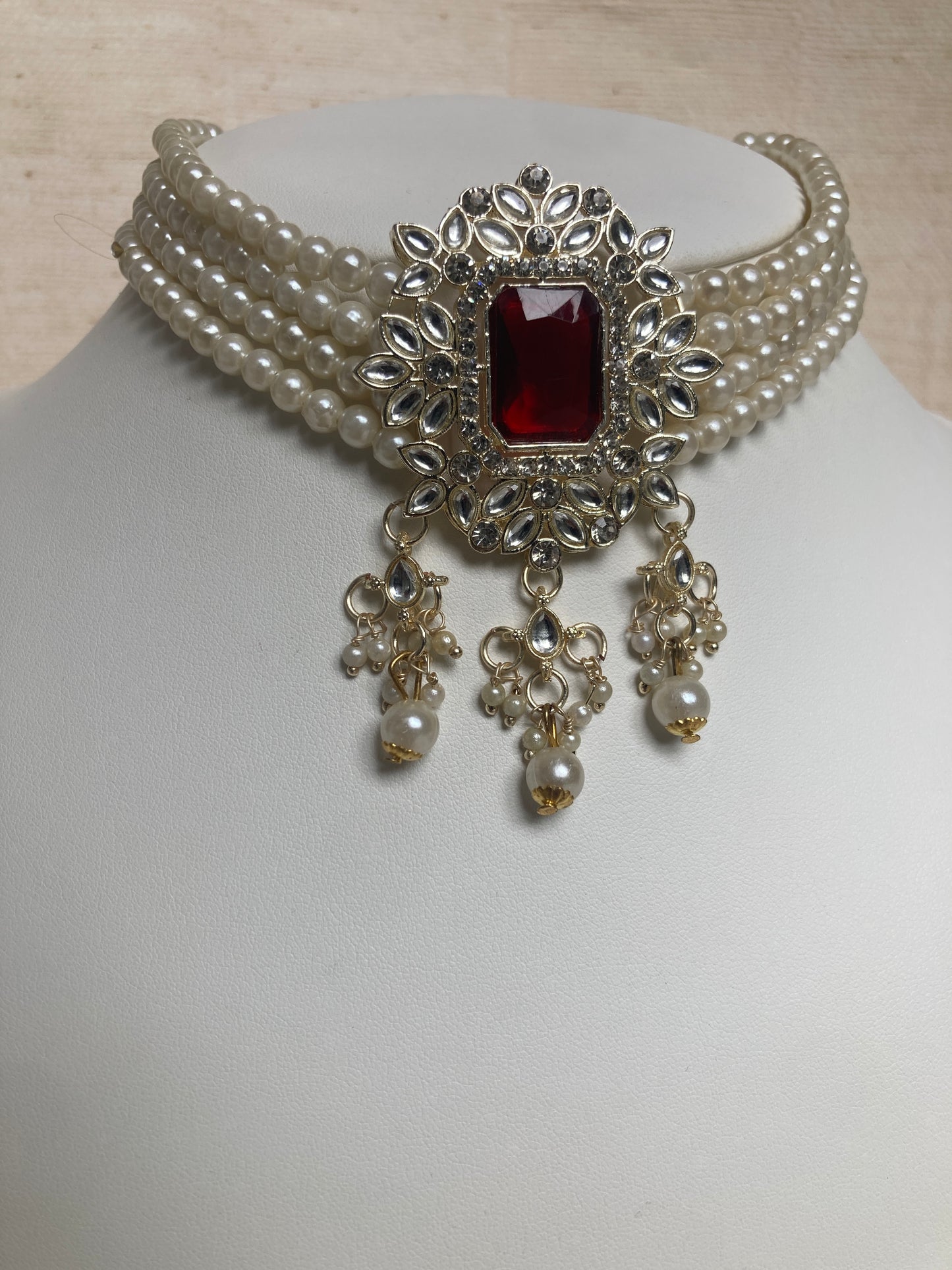 Anvi Gold Plated Kundan And Pearl Set (ST1013) (Maroon)