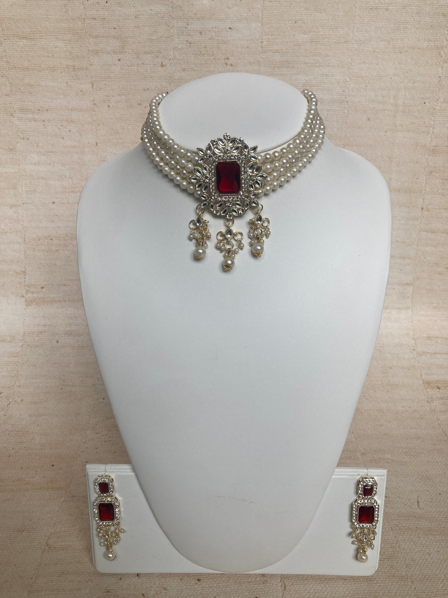 Anvi Gold Plated Kundan And Pearl Set (ST1013) (Maroon)