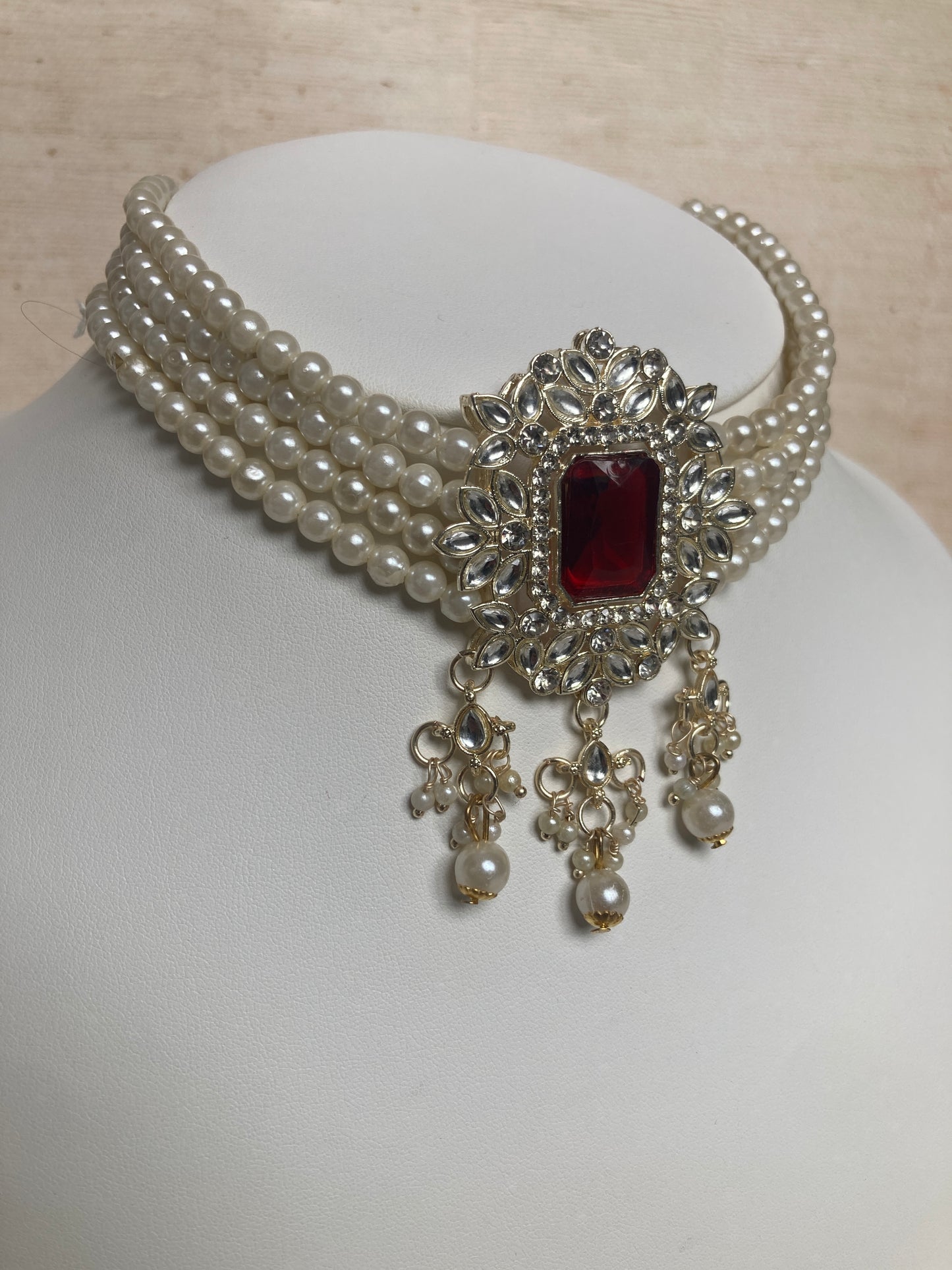 Anvi Gold Plated Kundan And Pearl Set (ST1013) (Maroon)