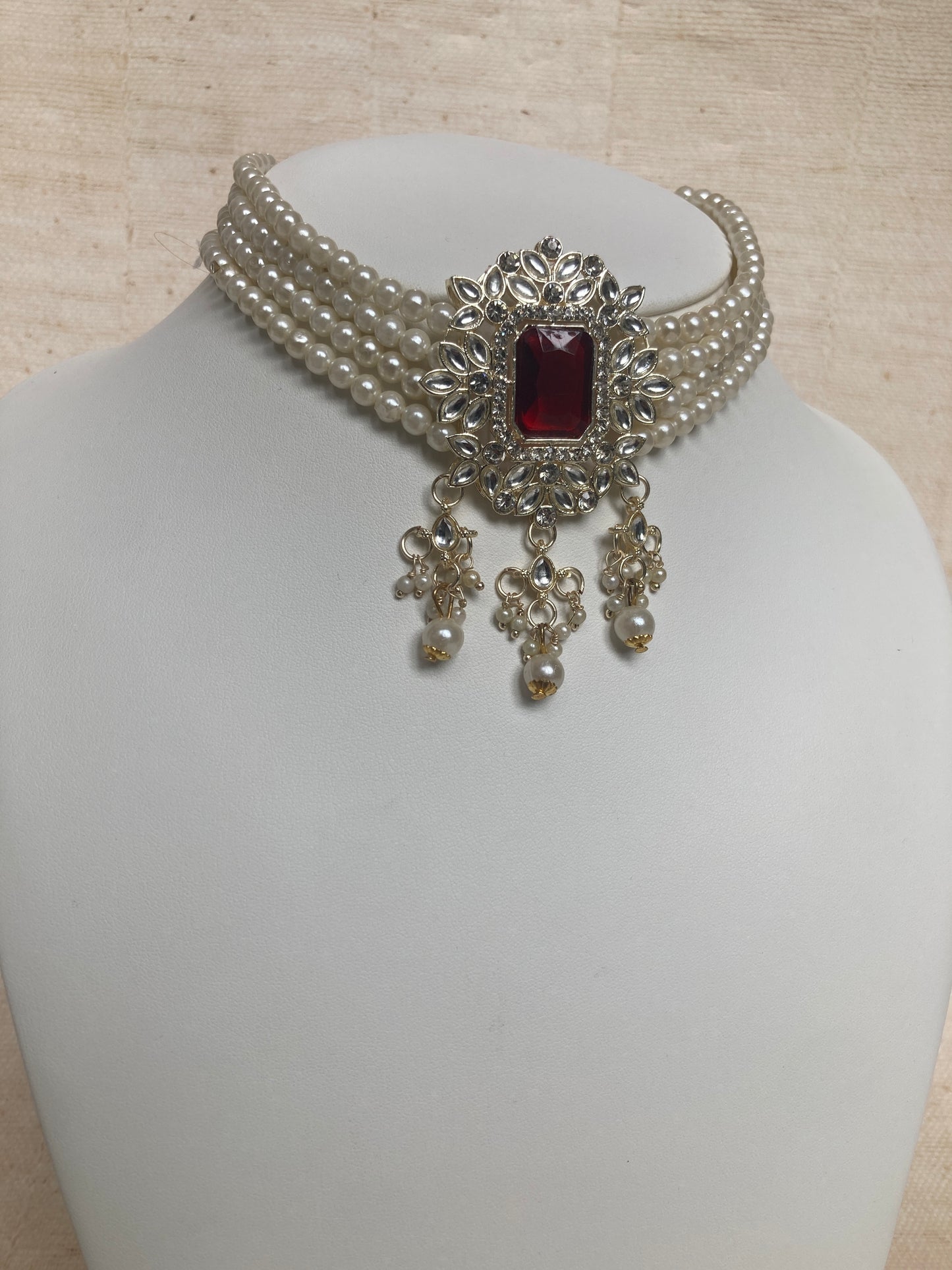 Anvi Gold Plated Kundan And Pearl Set (ST1013) (Maroon)
