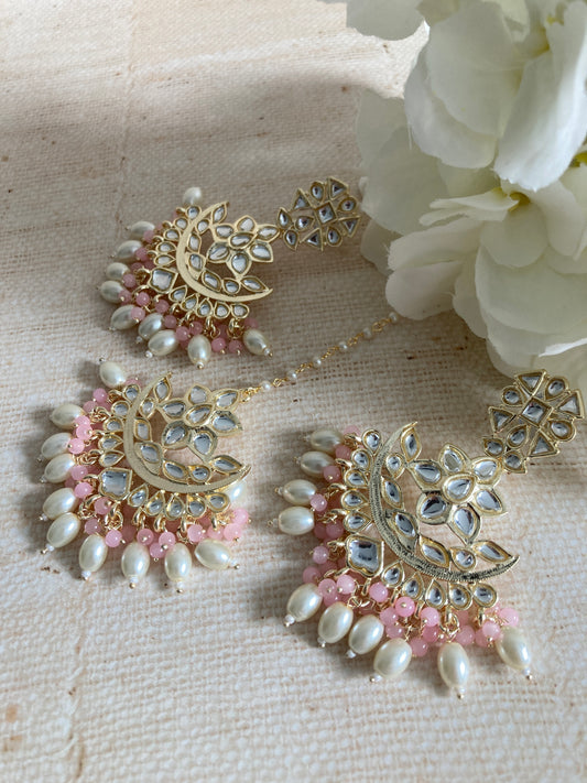 Ravina Pink Gold Plated Kundan Pearl Earrings And Tikka Set (ST942)