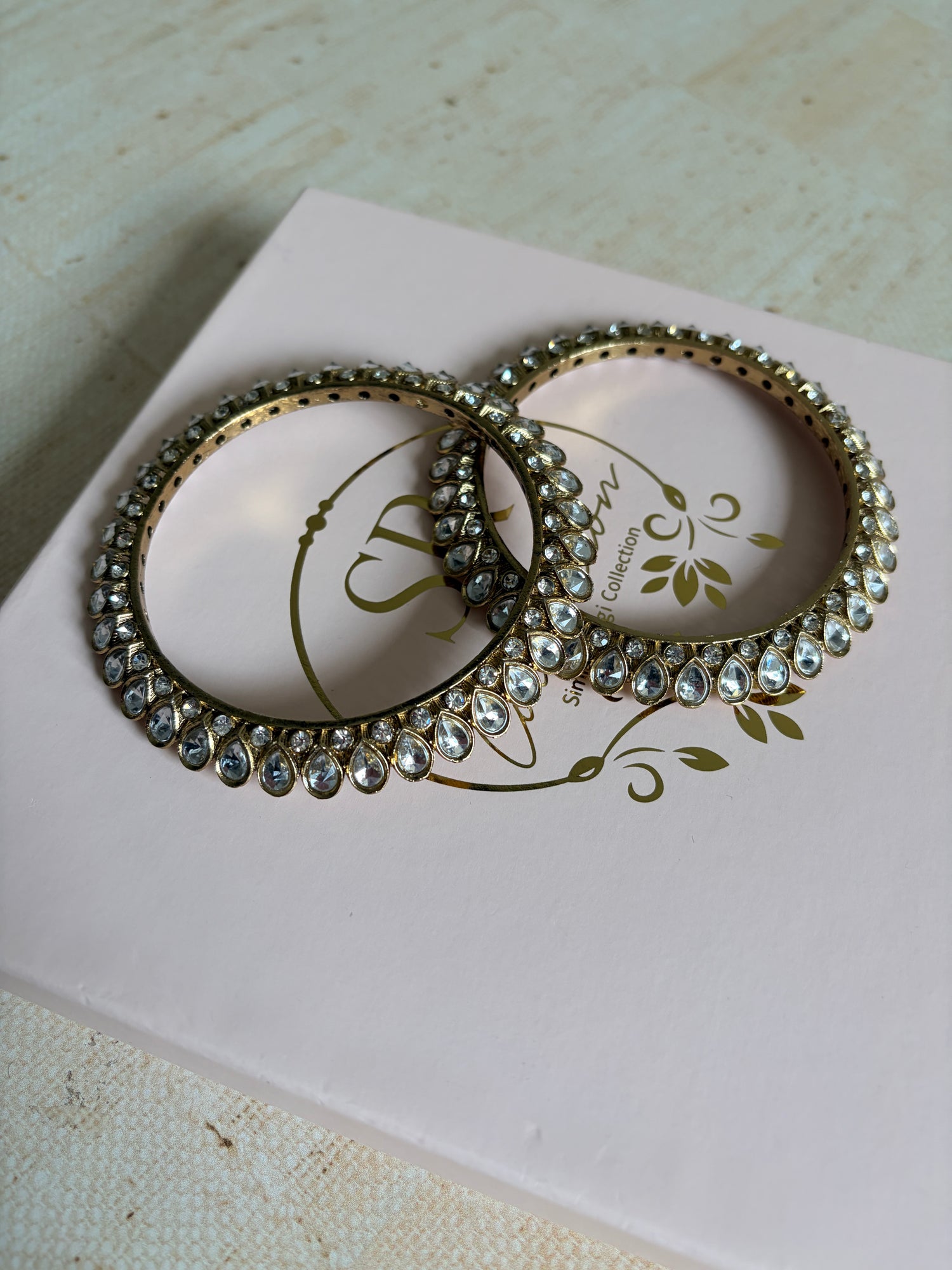 Myra Pair Of Gold Pearl Kundan Bangles 2.8 (ST1145)