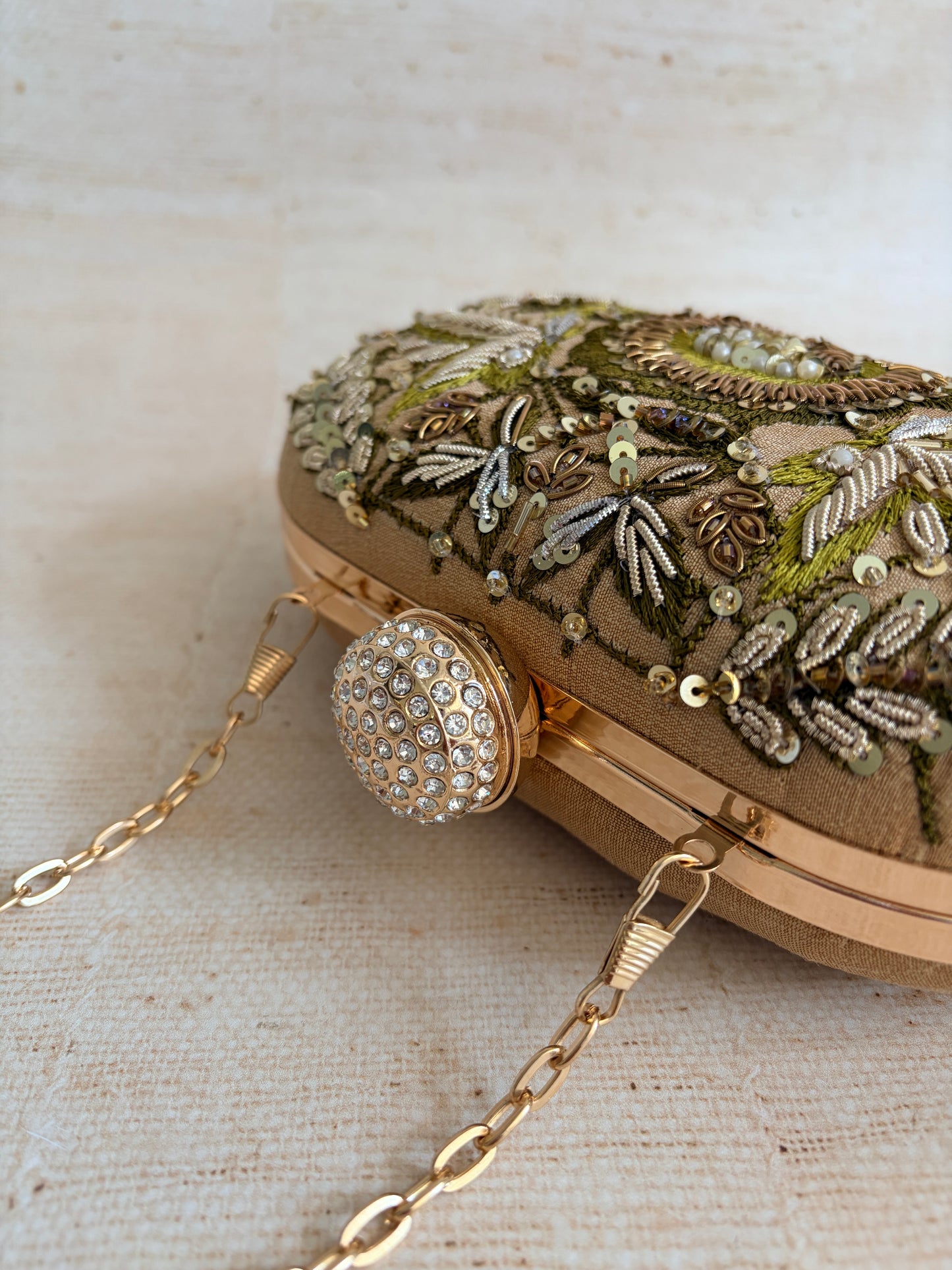 Livia Oval Gold Clutch (ST1167)