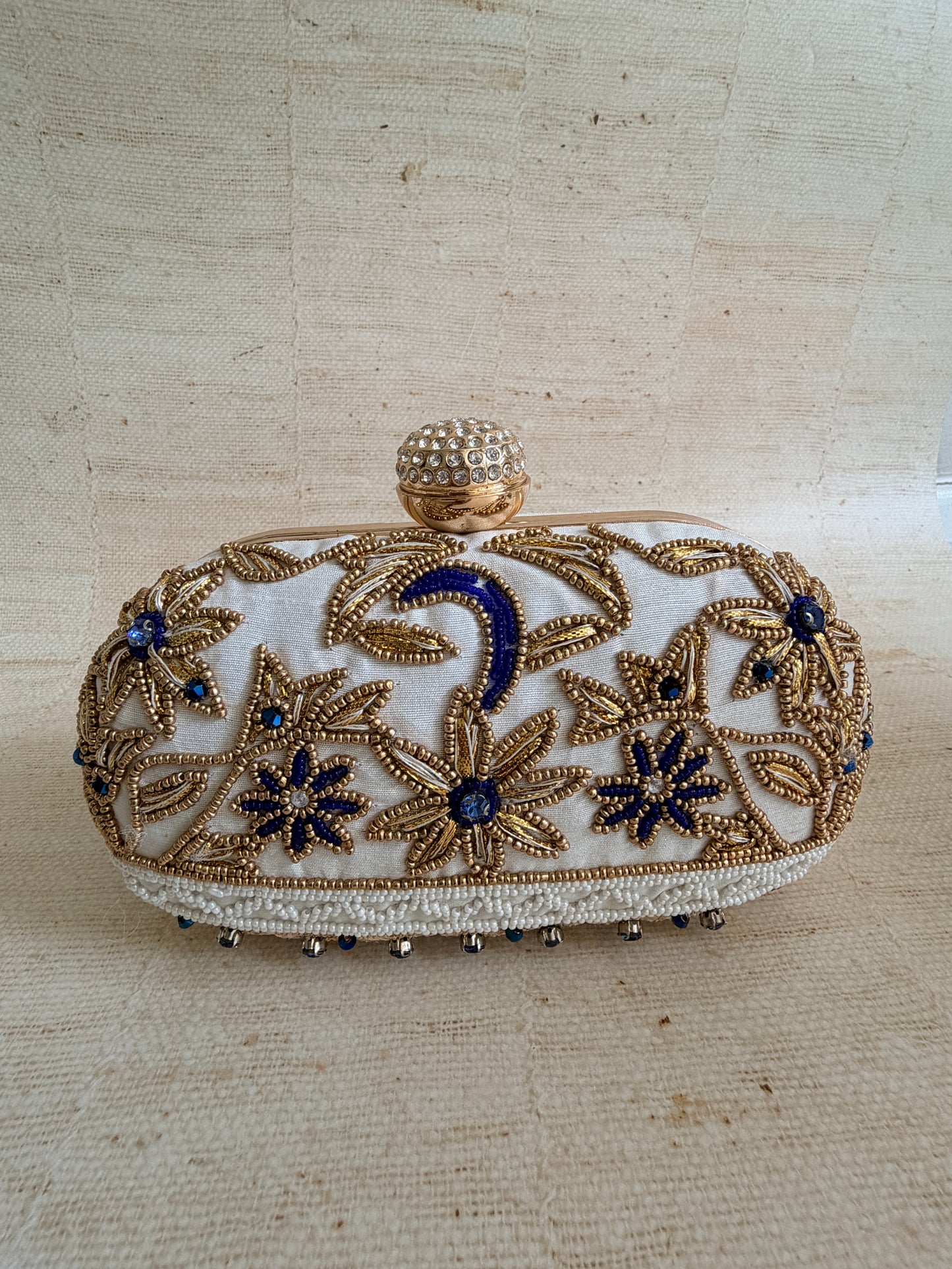 Fiorella Oval Off White Clutch (ST1168)