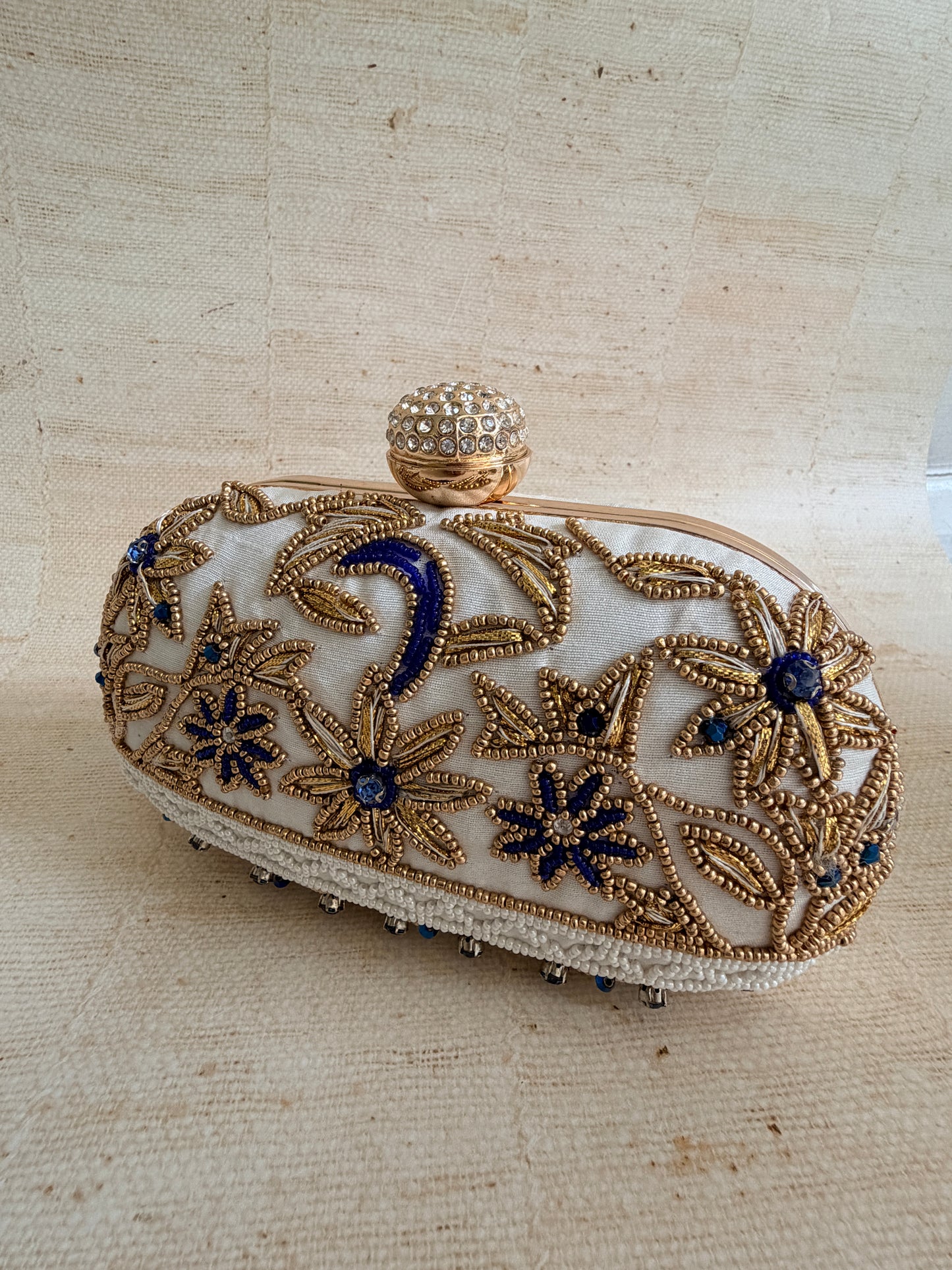 Fiorella Oval Off White Clutch (ST1168)