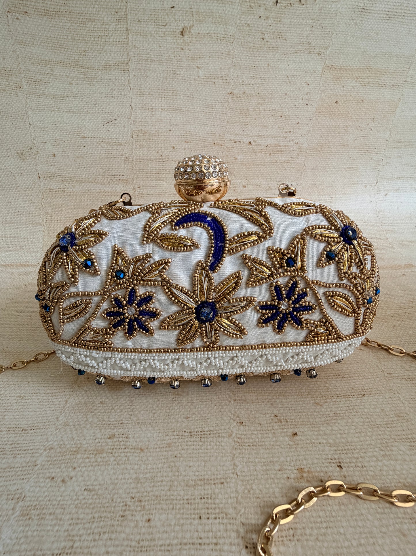 Fiorella Oval Off White Clutch (ST1168)