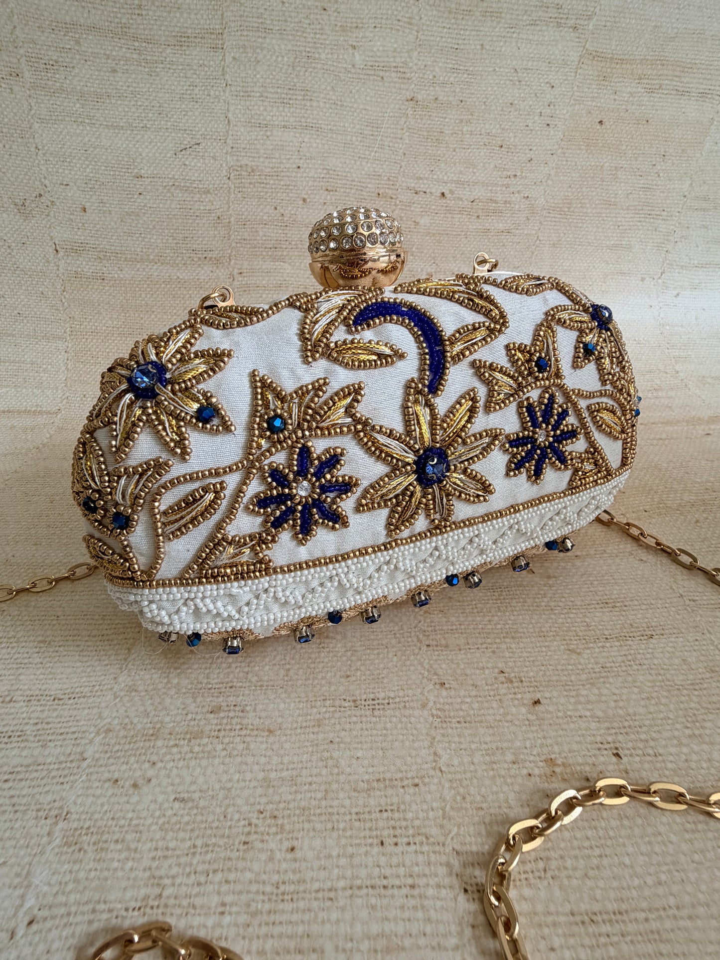 Fiorella Oval Off White Clutch (ST1168)