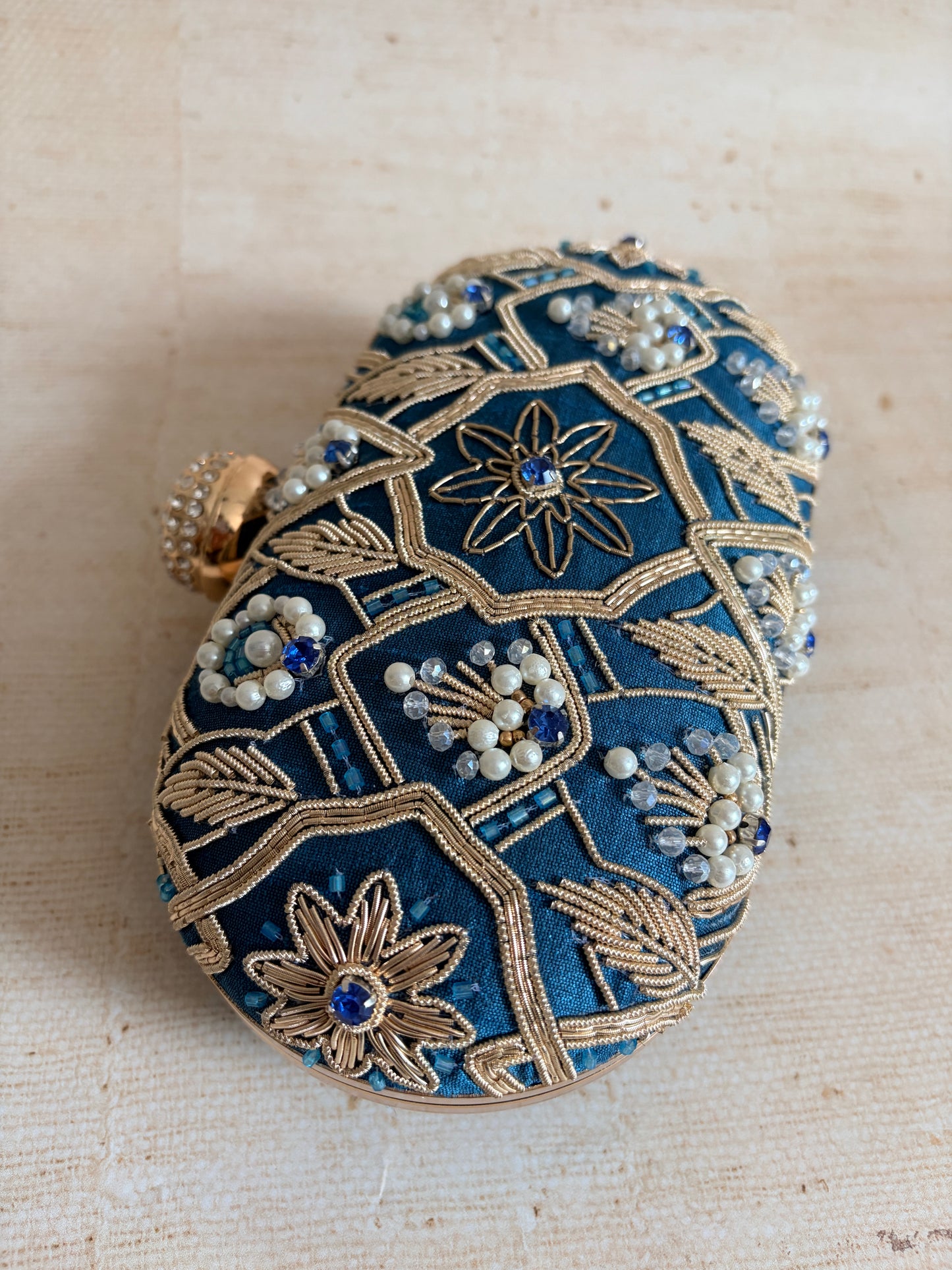 Eliana Oval Blue Clutch (ST1229)