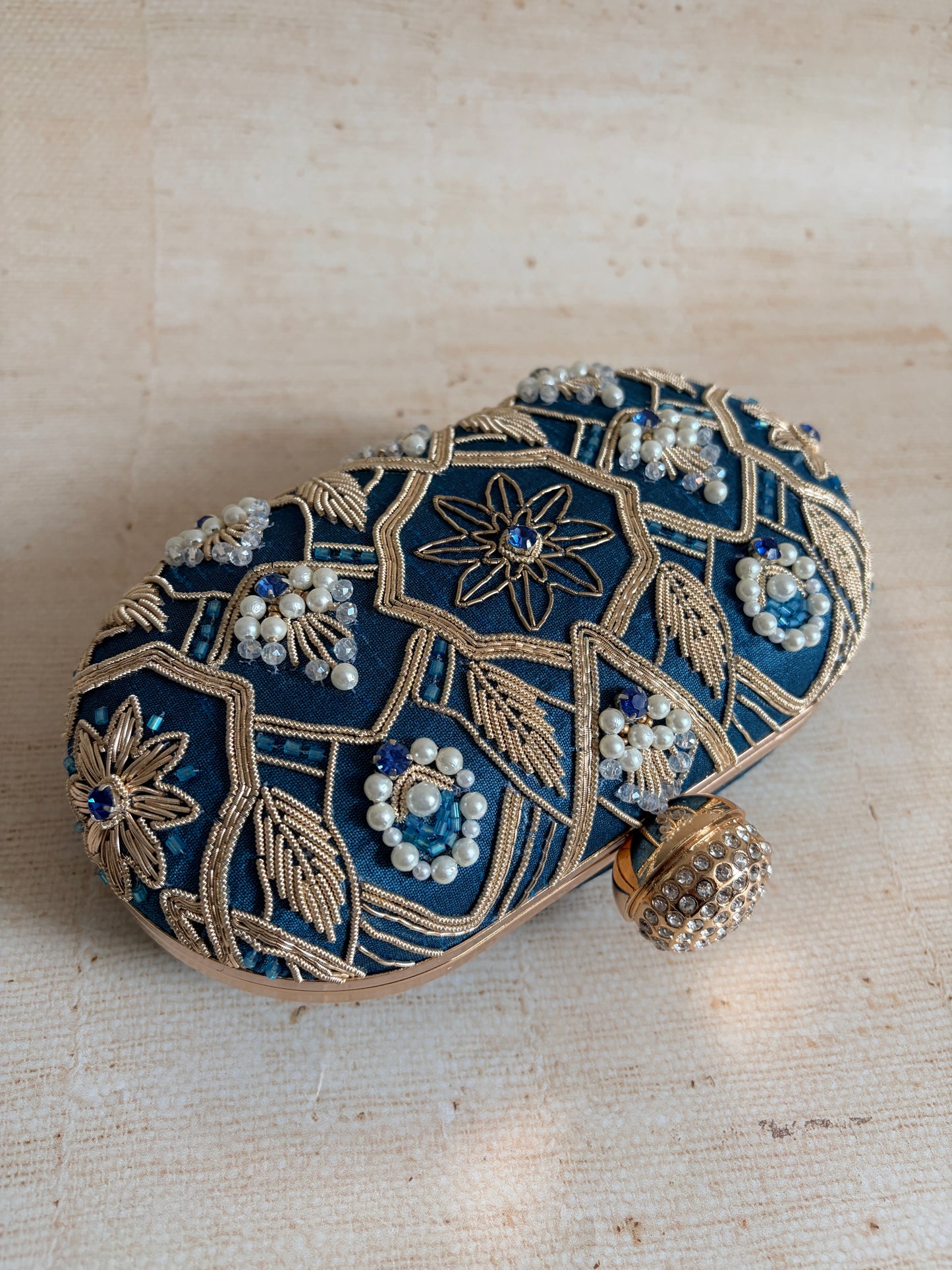 Eliana Oval Blue Clutch (ST1229)