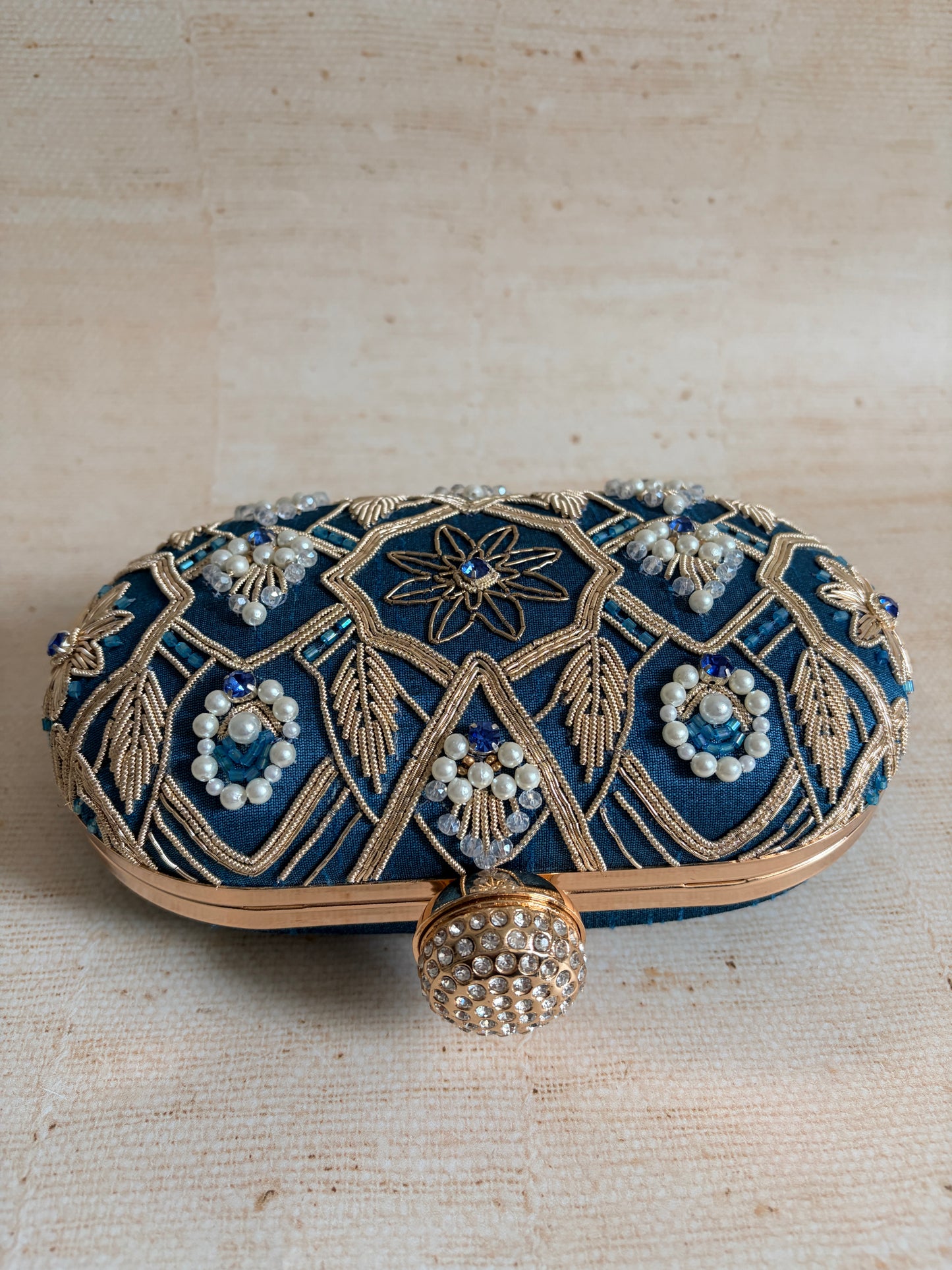 Eliana Oval Blue Clutch (ST1229)